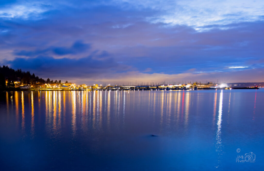 Appletree Cove in Kingston during Blue Hour with lights reflecting off smooth water