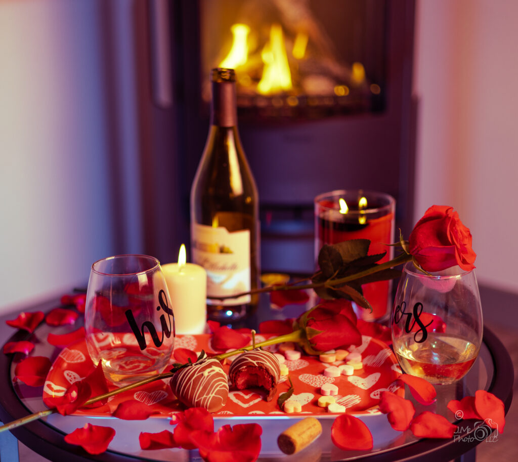Photo of wine, roses, rose petals, hearts and candles